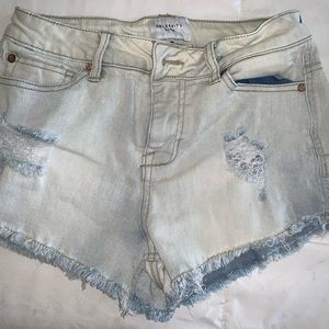 Light wash denim shorts.